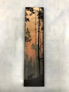 a painting of a bear in the woods at sunset with trees and sky behind it