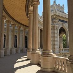 an ornate building with columns and arches