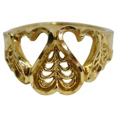 Discover the perfect blend of timeless elegance and playful charm with our 18K Gold Plated 1970s Hearts Ring. Crafted with precision and plated in luxurious 18k yellow gold, this ring showcases a whimsical heart design that will capture your heart. With its feminine and flirty aesthetics, this ring adds a touch of romance to any outfit. The heart-shaped motif symbolizes love and passion, making it an ideal gift to celebrate a special bond or simply to treat yourself to a piece of fine jewelry th Manolo Heels, Whimsical Heart, Charm Ring, Charm Rings, Romantic Dinners, Look Chic, Heart Design, Vivienne Westwood, Fashion Rings