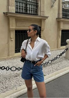 45 Ways to Style a White Button-Down Shirt - Boss Babe Chronicles Mum Short Outfits, Summer Outfits Paris Parisian Style, Shorts Outfits Women Poses, Classy Denim Shorts Outfit, Dark Blue Jean Shorts Outfit, Mom Shorts Outfit Summer, Minimalist Summer 2024 Outfits, Short Mom Jeans, Denim Shorts Outfit