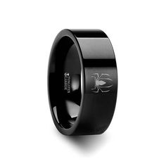 a black ring with an antelope engraved on it