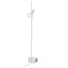 a white floor lamp with two lights attached to it