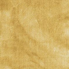 an old yellow cloth textured background or wallpaper with some faded edges and stains