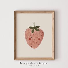 a painting of a strawberry is hanging on the wall