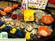 an assortment of doughnuts and other items on a tray with the words bakery