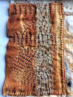 an old piece of cloth that has been stitched together