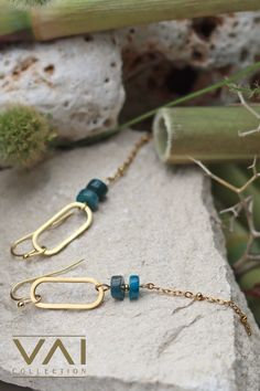 Dangling earrings, named “Blue Ocean” with Apatite gemstones. These beautiful sea-inspired earrings are reminiscent of sparkling turquoise seawater reflecting the sun. These earrings are elegant and timeless and remind you of beach holidays, walking barefoot in the sand, sun-kissed skin, swimming in the cold sea, picnicking on the sand, the smell of sunscreen, salty hair, sand castles and rosé wine. The electric blue colored Apatite stone is very enchanting and looks lovely in this design. Sea Inspired Earrings, Sea Inspired Jewelry, Rosé Wine, Sand Castles, Ocean Earrings, Beach Holidays, Apatite Stone, Salty Hair, Sea Inspired