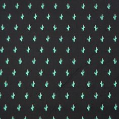 a black background with green and red cactus print