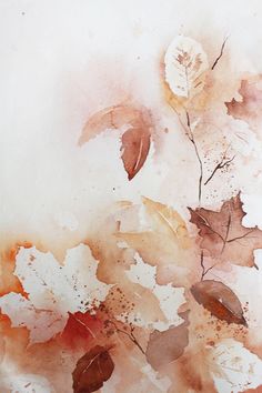 watercolor painting of leaves on white paper with brown and orange colors in the background