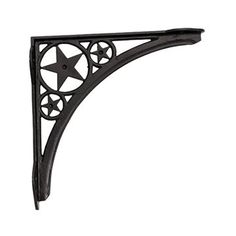 black iron shelf bracket with star and wheel design