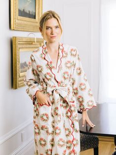 Final Sale: no returns or exchanges Heidi's luxe cotton classic robe immediately evokes the holiday spirit in an artistic palette of soft reds and forest greens. The ultimate in daily relaxation wear, it strikes a perfect balance between comfort and cheer with the refined and flattering drape of soft cotton, edged with delicate scalloped trim in a complementary shade to the wintry pattern of pine boughs and bold berries. Thoughtfully adorned with an attached belt and pockets, our classic robe ensures you wind down a silent night looking as polished as you did throughout the day. Need a slightly warmer option? Our fleece-lined version of this special 2022 holiday print makes the perfect gift for friends and loved ones. Product Details Lightly tailored silhouette in a soft, lightweight 100% Designer Loungewear, Holiday Symbols, Terry Robe, Pink Flannel, Holiday Wear, Hanging Wreath, Cool Gifts For Women, Feather Light, Holiday Prints