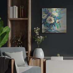 a living room filled with furniture and a painting on the wall