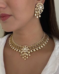 Discover the timeless elegance of our SoniGal Kundan Necklace, a stunning piece that effortlessly blends traditional Indian craftsmanship with modern sophistication. This lightweight necklace features exquisite Kundan stones that catch the light beautifully, making it the perfect accessory for any occasion, from casual outings to formal events. Key Features: Versatile Design: Perfect for pairing with both Indian and Western outfits, this necklace is a must-have addition to your jewelry collection. Lightweight Comfort: Enjoy all-day wear without the weight, making it ideal for long events or daily styling. Handcrafted Quality: Each piece is meticulously crafted to ensure you receive a unique work of art that embodies elegance and grace. Why You'll Love It  This Kundan necklace is not just j Light Weight Kundan Necklace, Exquisite Bridal Necklace For Festive Season, Elegant Gold Kundan Necklace With Meenakari, Elegant Yellow Gold Kundan Temple Necklace, Elegant Gold Chandbali Kundan Necklace, Elegant Chandbali Temple Necklace In Yellow Gold, Elegant Kundan Temple Necklace In Yellow Gold, Elegant Yellow Gold Meenakari Necklace, Elegant Yellow Gold Chandbali Bridal Necklace