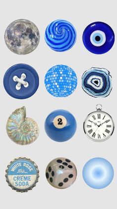 several different types of buttons and magnets on a white background