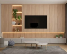 a modern living room with wood paneling and built - in entertainment center, tv on the wall