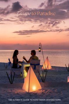 the ultimate guide to honeymoon destinations escape to paradise book cover with two people sitting at a table on the beach