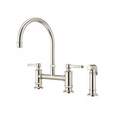 a kitchen faucet with two handles and nozzles