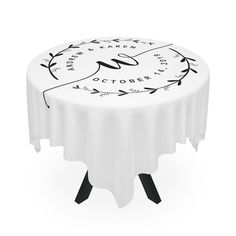 a white table with a black and white design on the top that says new year's eve