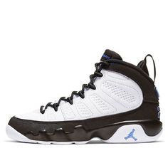 The Air Jordan 9 Retro GS 'University Blue' is a sneaker built for big kids that nod to Michael Jordan's alma mater. The design is reminiscent of Air Jordan 9 PE colorways worn by the likes of Penny Hardaway and Nick Anderson in the mid '90s. A simple white and black palette is executed on the leather upper, secured with non-binding rope laces and accented with powder blue branding hits. They include an embroidered ‘23’ on the heel and a Jumpman icon on the lateral midsole. (AJ9/SNKR) Blue Branding, Air Jordan 9 Retro, Black Palette, Penny Hardaway, Jordan 9 Retro, Air Jordan 9, Mid 90s, Jordan 9, Alma Mater