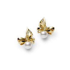 Prized for their brilliant luster and rich color, Akoya pearls are a traditional symbol of elegance and beauty. These MIKIMOTO yellow gold ribbon earrings are accented with an 7mm A+ Akoya pearl and are suspended from a delicately crafted 18k yellow gold bow with diamond accents. MIKIMOTO Style #: MEQ10123ADXK Elegant Yellow Gold Pearl Earrings For Formal Occasions, Refined Yellow Gold Pearl Earrings For Anniversary, Elegant Akoya Pearl Earrings In Yellow Gold, Elegant Yellow Gold Akoya Pearl Earrings, Exquisite Yellow Gold Pearl Earrings For Formal Occasions, Gold Refined Pearl Earrings For Formal Occasions, Refined Gold Pearl Earrings For Formal Events, Refined Gold Pearl Earrings For Formal Occasions, Refined Yellow Gold Pearl Earrings For Formal Occasions