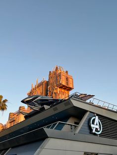 the top of a building with a clock on it