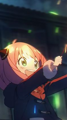 an anime character holding a wand in her hand