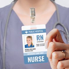 a nurse is holding up her id card