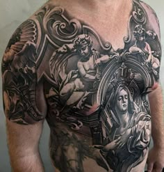 a man with tattoos on his chest