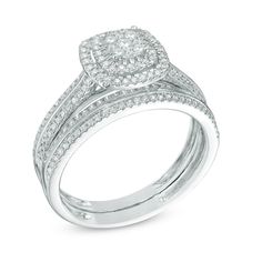 a white gold ring with two rows of diamonds on the band and a square shaped center stone