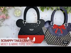 two mickey and minnie mouse purses with bows on them, one is black and the other is red