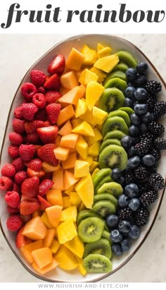 a plate full of fruit with the title overlay that reads, how to make a rainbow fruit tray