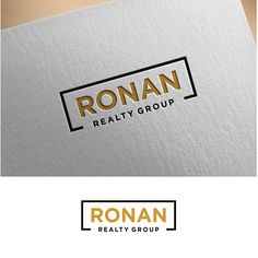 the logo for roman realty group is shown in gold and black on a white background