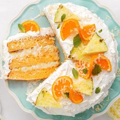 there is a piece of cake on the plate with oranges and whipped cream around it