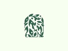 an abstract logo with leaves and fish