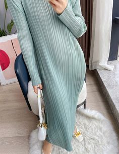 This versatile Pleated Long Sleeve Slim Fit Midi Dress can be dressed up or down to suit any situation. The lightweight fabric also lets you stay cool on a hot summer day. Ribbed V-neck Sweater Dress For Spring, Elegant Ribbed V-neck Maxi Dress, Winter Stretch V-neck Dress, Elegant Green V-neck Long Sleeve Dress, Chic Green V-neck Sweater Dress, Casual V-neck Sweater Dress For Spring, Stretch V-neck Midi Dress For Winter, Chic Long Sleeve V-neck Dress For Winter, Winter Stretch V-neck Midi Dress