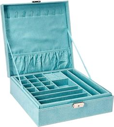 an open blue velvet jewelry box on a white background