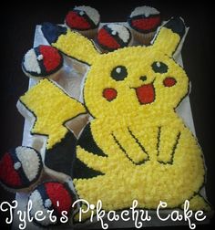 there is a pokemon cake with cupcakes in the shape of pikachu