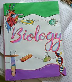 a notebook with the word biology written on it