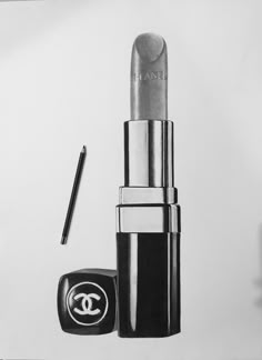 a pencil drawing of a chanel lipstick with a small black and white object next to it