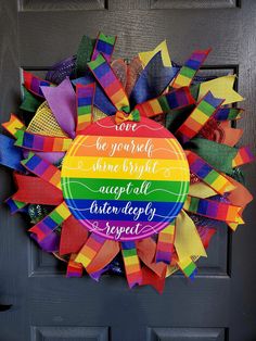 a colorful wreath that says, love be yourself some bright accept all other deeply respect