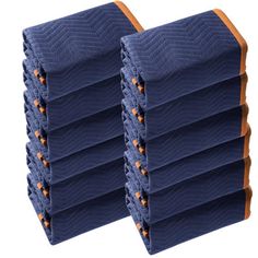 six pieces of blue and orange cloth stacked on top of each other in front of a white background