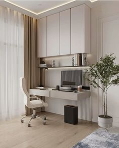 a white desk with a computer on top of it in front of a window next to a potted plant