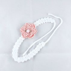 Crochet flower headband, fits age 3 years to adult. Measures 34cm + ties, flower appliqué measures 6.5cm diameter. Made from 100% cotton. Bohemian White Headband, Pink Beach Headband Hair Accessory, Pink Headband For Beach, Pink Beach Headband, Cute Adjustable Headband For Wedding, Cute Adjustable Headband For Weddings, White Headpieces For Spring Gift, White Headpieces As A Spring Gift, Adjustable Flower Headband For Summer