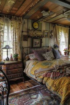 a bed room with a neatly made bed and lots of pillows on top of it