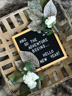 a sign that says and so the adventure begins hello new year