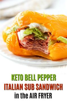 a close up of a sandwich on a plate with the words keto bell pepper italian sub sandwich in the air fryer