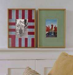 two framed pictures hang on the wall next to a bed with pillows and throw pillows