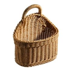 a wicker basket is shown on a white background, with the handle extended to it's side