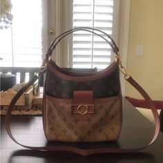 Authentic. No Sign Of Wear. Strap Included. Dust Bag Included. Dimensions: Base Length: 12 In Height: 10.5 In Width: 5.5 In Drop: 11.5 In Louis Vuitton Dauphine, Hobo Crossbody Bag, Bags Louis Vuitton, No Sign, Louis Vuitton Bags, Louis Vuitton Bag, Crossbody Bag, Dust Bag, Bag Lady