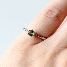 Authentic Moldavite ring- faceted moldavite ring 4 mm Rounds stone. 925 Sterling Silver moldavite ring. Jewelry made of the highest quality silver. It is free of nickel, cadmium and lead. Fine gem quality MOLDAVITE mined and cut in the Czech MOLDAVITE- from the group of impactites, one of the types of tektites, the remains of the fragments of a comet that did not burn out in the Earth's atmosphere 15 million years ago. Gift-ready: authentic Moldavite Jewelry is sent in gift boxes of various colo Moldavite Rings, Moldavite Aesthetic, Wire Wrapped Moldavite, Earth's Atmosphere, Crystal Moldavite, Moldavite Ring, Moldavite Jewelry, Moldavite Stone, Burn Out